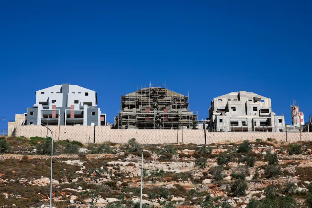 Israel gives legal status to 19 more settlements